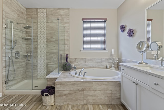 78 Honeysuckle Dr, Manahawkin, NJ 08050 - full bathroom with vanity, a garden tub, wood finished floors, and a stall shower