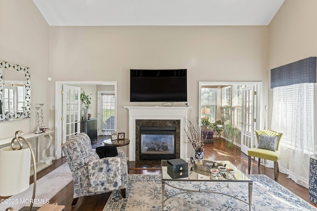 78 Honeysuckle Dr, Manahawkin, NJ 08050 - living area with a towering ceiling, wood finished floors, and a high end fireplace