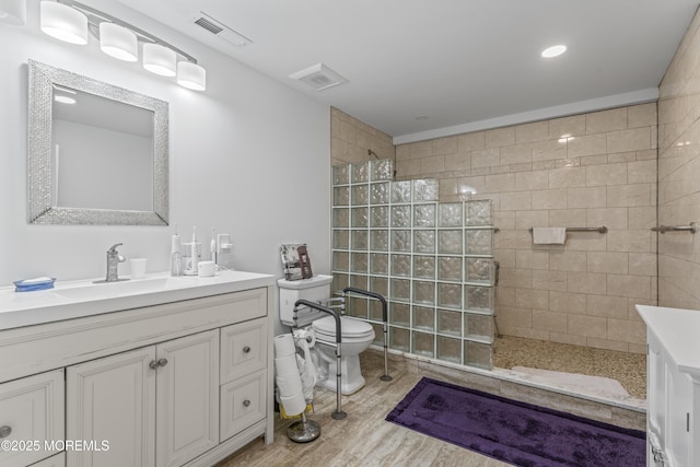 78 Honeysuckle Dr, Manahawkin, NJ 08050 - full bathroom featuring vanity, a walk in shower, wood finished floors, and recessed lighting