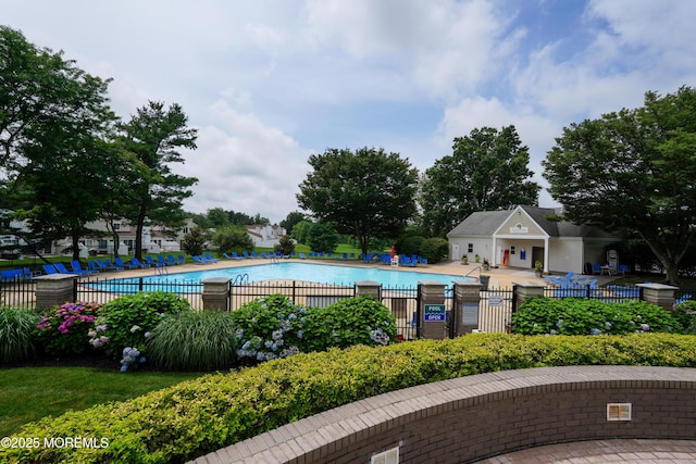186 Snow Drop Pl, Freehold, NJ 07728 - community pool featuring a patio