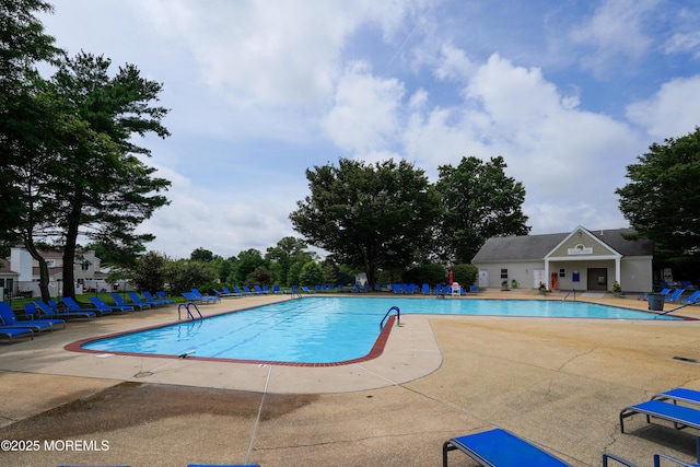 186 Snow Drop Pl, Freehold, NJ 07728 - community pool with a patio