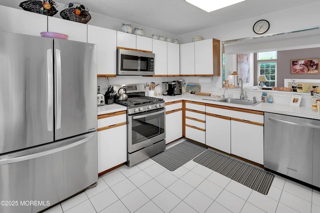 186 Snow Drop Pl, Freehold, NJ 07728 - kitchen featuring appliances with stainless steel finishes, light countertops, and white cabinetry