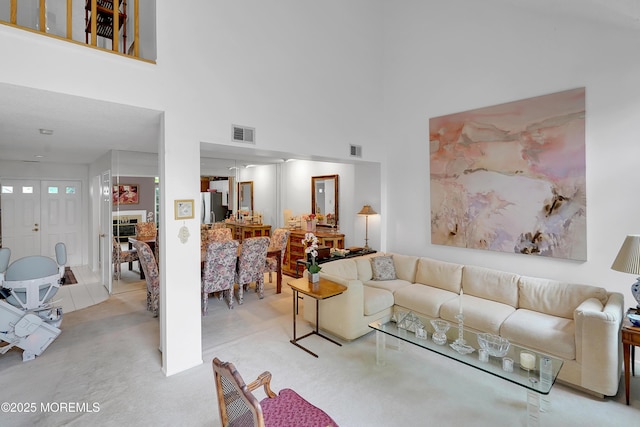186 Snow Drop Pl, Freehold, NJ 07728 - living area with light carpet and a high ceiling