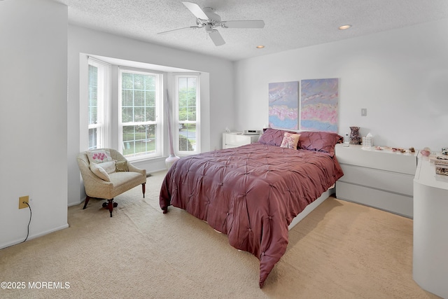 186 Snow Drop Pl, Freehold, NJ 07728 - carpeted bedroom with a textured ceiling, a ceiling fan, and recessed lighting
