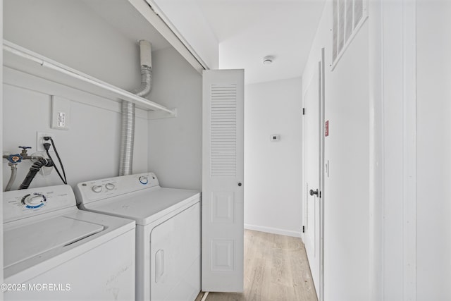 410 Owls Nest Ct, Jackson, NJ 08527 - washroom featuring light wood-style floors and separate washer and dryer
