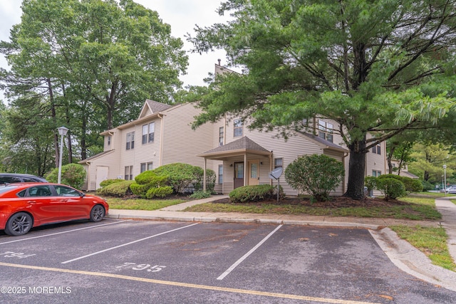 410 Owls Nest Ct, Jackson, NJ 08527 - view of building exterior featuring uncovered parking