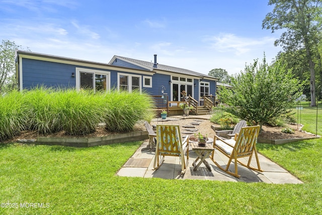 11 Sharon Dr, Ocean Twp, NJ 07712 - back of property featuring a wooden deck, a yard, and a patio area