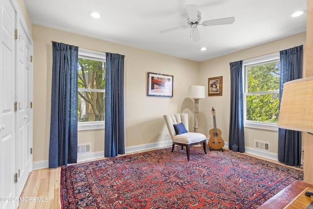 11 Sharon Dr, Ocean Twp, NJ 07712 - sitting room with healthy amount of natural light, wood finished floors, recessed lighting, and a ceiling fan