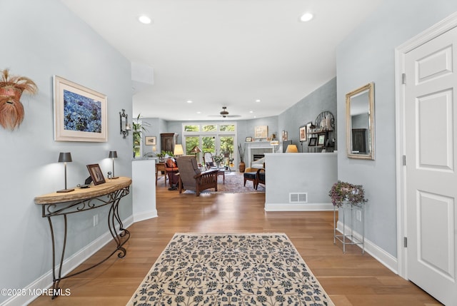 11 Sharon Dr, Ocean Twp, NJ 07712 - hallway with wood finished floors and recessed lighting