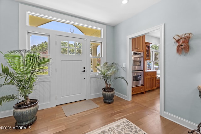 11 Sharon Dr, Ocean Twp, NJ 07712 - foyer entrance with light wood-type flooring and baseboards