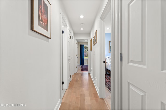 11 Sharon Dr, Ocean Twp, NJ 07712 - corridor with light wood finished floors and recessed lighting
