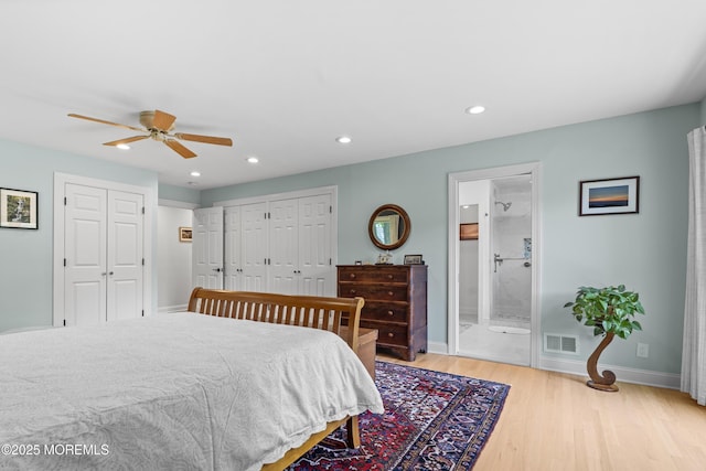 11 Sharon Dr, Ocean Twp, NJ 07712 - bedroom with light wood-type flooring, multiple closets, recessed lighting, ensuite bathroom, and a ceiling fan
