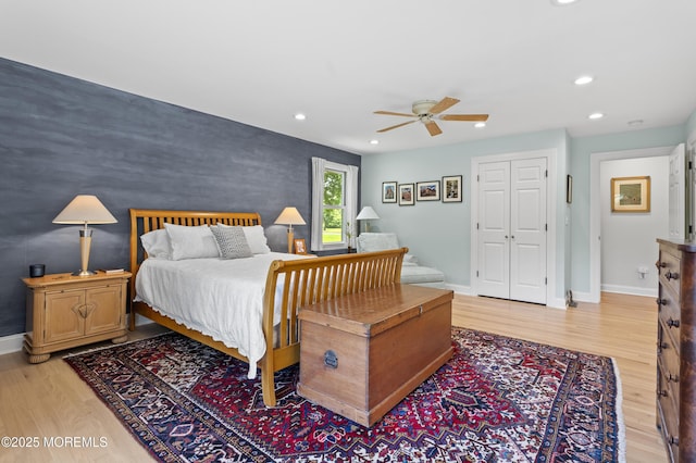 11 Sharon Dr, Ocean Twp, NJ 07712 - bedroom with light wood finished floors, recessed lighting, an accent wall, a closet, and a ceiling fan