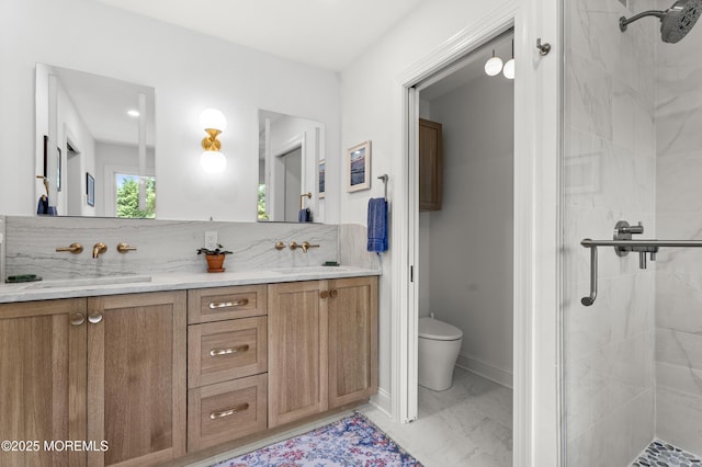 11 Sharon Dr, Ocean Twp, NJ 07712 - bathroom with a shower stall, double vanity, marble finish floors, and tasteful backsplash