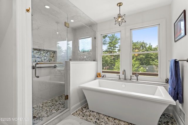 11 Sharon Dr, Ocean Twp, NJ 07712 - bathroom with a freestanding tub, a stall shower, and recessed lighting
