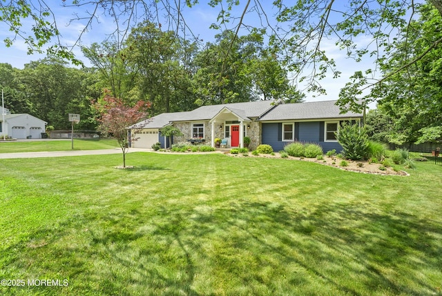11 Sharon Dr, Ocean Twp, NJ 07712 - single story home with a front lawn, driveway, and a garage