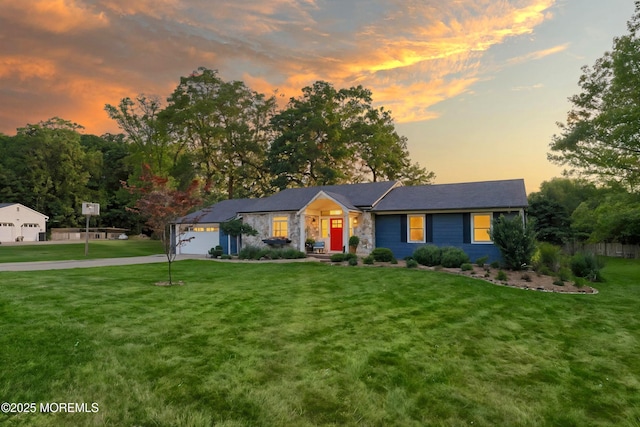 11 Sharon Dr, Ocean Twp, NJ 07712 - view of front of house with an attached garage, a front yard, concrete driveway, and stone siding