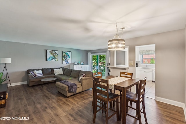 65 Cedar Ave Unit C10, Long Branch, NJ 07740 - dining area with dark wood-type flooring and baseboards