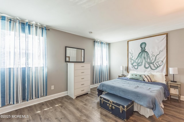 65 Cedar Ave Unit C10, Long Branch, NJ 07740 - bedroom with multiple windows and wood finished floors