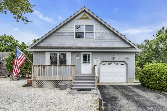 211 Meadow Blvd, Brick, NJ 08723 - view of front of property with a shingled roof, driveway, covered porch, and board and batten siding