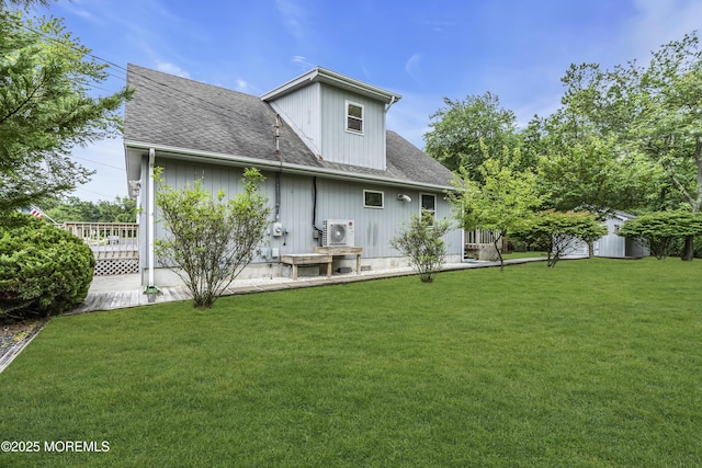 211 Meadow Blvd, Brick, NJ 08723 - rear view of house featuring roof with shingles and a yard