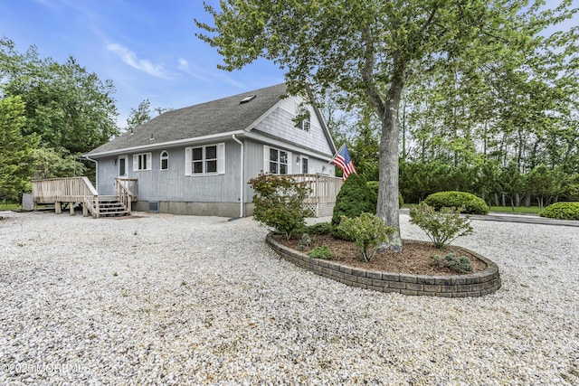 211 Meadow Blvd, Brick, NJ 08723 - view of property exterior featuring a wooden deck and a shingled roof