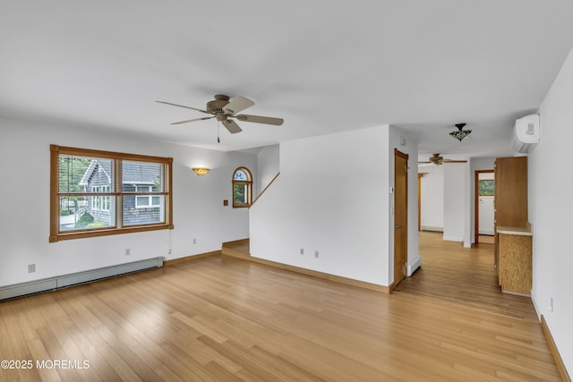 211 Meadow Blvd, Brick, NJ 08723 - empty room with ceiling fan, light wood finished floors, an AC wall unit, and a baseboard radiator