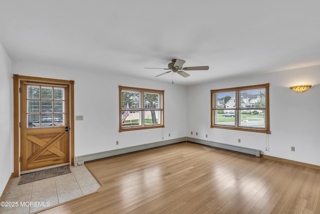 211 Meadow Blvd, Brick, NJ 08723 - foyer entrance featuring a ceiling fan, light wood-type flooring, and baseboard heating