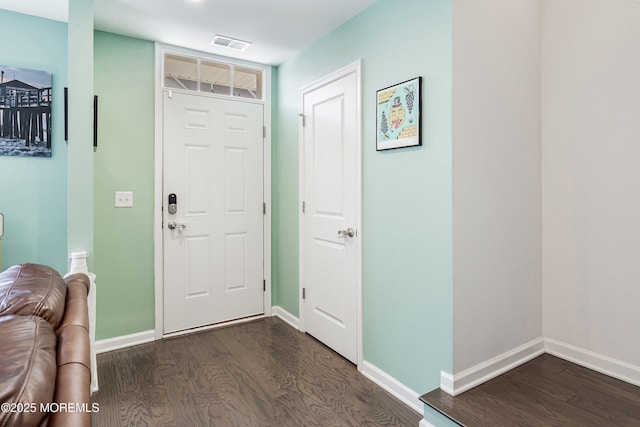 107 Celebration Blvd, Brick, NJ 08723 - foyer entrance with dark wood-type flooring and baseboards
