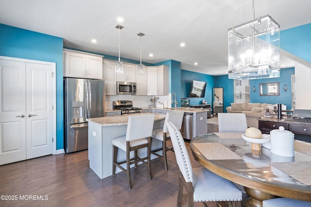 107 Celebration Blvd, Brick, NJ 08723 - dining space with dark wood finished floors, a chandelier, and recessed lighting
