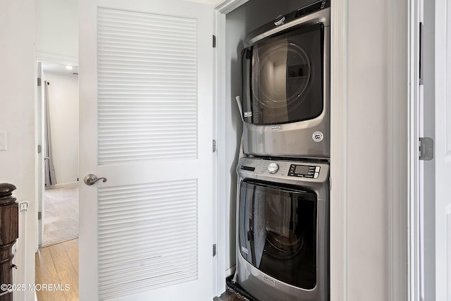107 Celebration Blvd, Brick, NJ 08723 - washroom with stacked washer / drying machine and wood finished floors