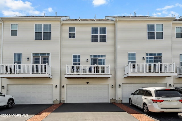 107 Celebration Blvd, Brick, NJ 08723 - back of house with an attached garage and driveway