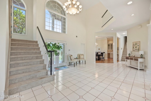 9 Old Cider Mill Rd, Manalapan, NJ 07726 - foyer featuring stairs, a chandelier, recessed lighting, and a high ceiling