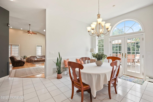 9 Old Cider Mill Rd, Manalapan, NJ 07726 - dining space with vaulted ceiling, a chandelier, french doors, a ceiling fan, and light tile patterned flooring