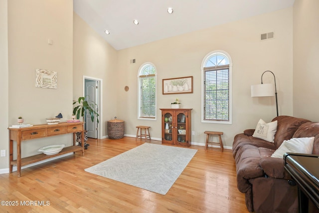 9 Old Cider Mill Rd, Manalapan, NJ 07726 - living room featuring light wood finished floors, high vaulted ceiling, and recessed lighting