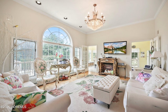 9 Old Cider Mill Rd, Manalapan, NJ 07726 - living area with a chandelier, crown molding, wood finished floors, and recessed lighting