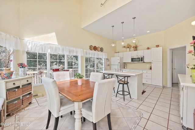 9 Old Cider Mill Rd, Manalapan, NJ 07726 - dining room with a towering ceiling and light tile patterned floors