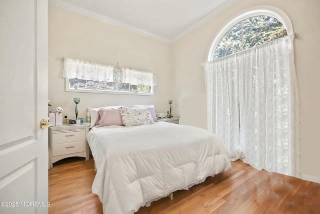 9 Old Cider Mill Rd, Manalapan, NJ 07726 - bedroom featuring ornamental molding, light wood-style floors, and multiple windows