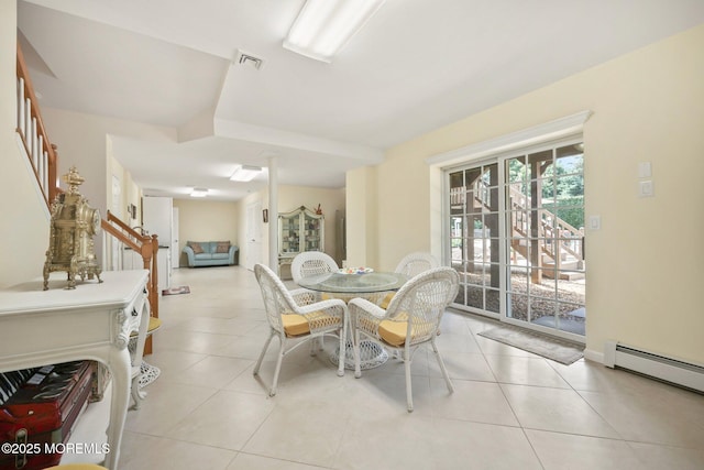 9 Old Cider Mill Rd, Manalapan, NJ 07726 - dining area featuring stairs, light tile patterned flooring, and a baseboard heating unit