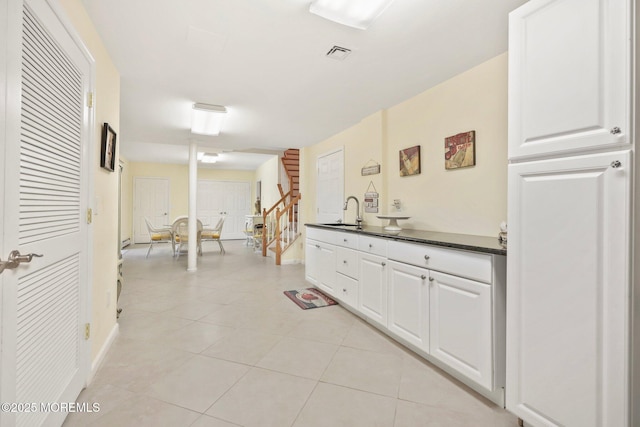 9 Old Cider Mill Rd, Manalapan, NJ 07726 - corridor with stairway and light tile patterned floors