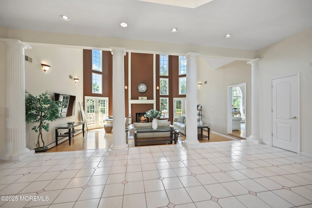 9 Old Cider Mill Rd, Manalapan, NJ 07726 - foyer entrance with decorative columns, a high ceiling, and recessed lighting