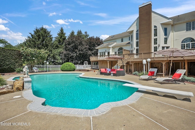 9 Old Cider Mill Rd, Manalapan, NJ 07726 - view of pool with an outdoor living space, a patio area, and a diving board