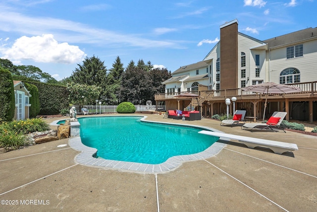 9 Old Cider Mill Rd, Manalapan, NJ 07726 - view of pool with a patio area, an outdoor hangout area, a diving board, and a wooden deck