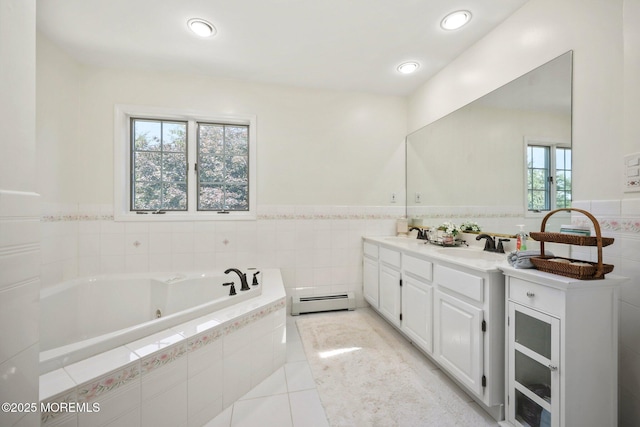 9 Old Cider Mill Rd, Manalapan, NJ 07726 - bathroom with baseboard heating, double vanity, plenty of natural light, a tub with jets, and wainscoting