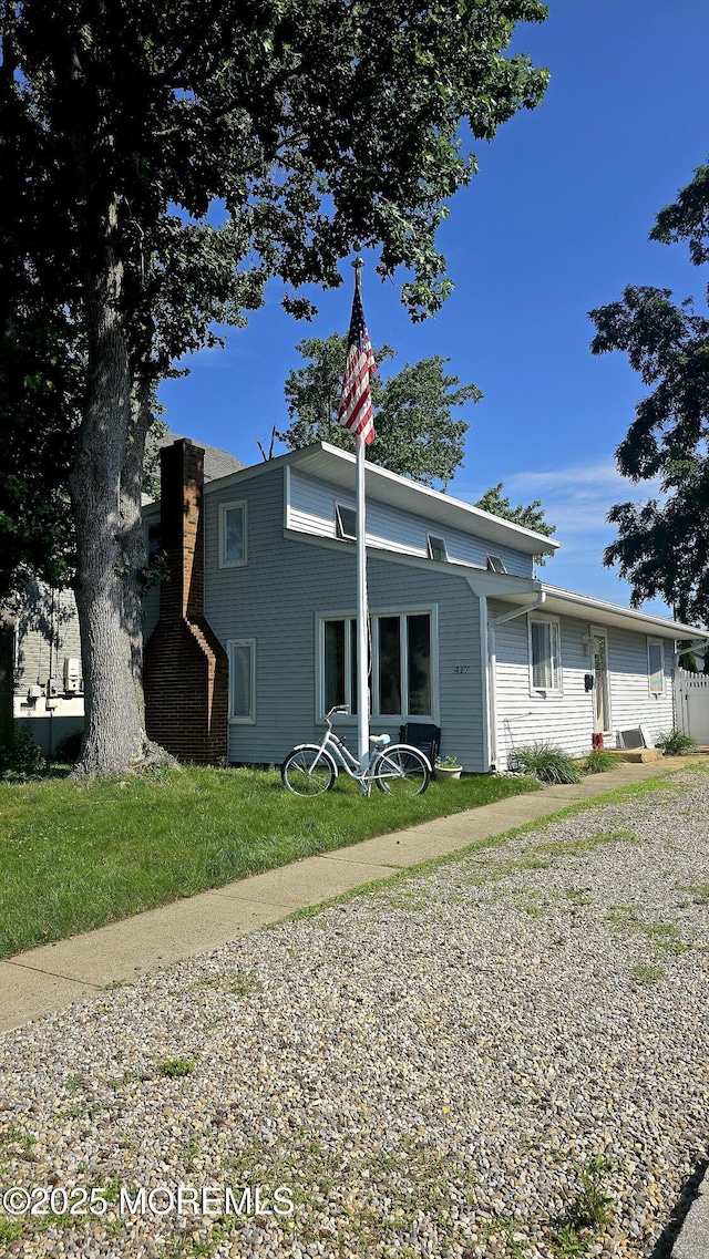 417 Carter Ave, Point Pleasant Beach, NJ 08742 - view of front facade with a chimney