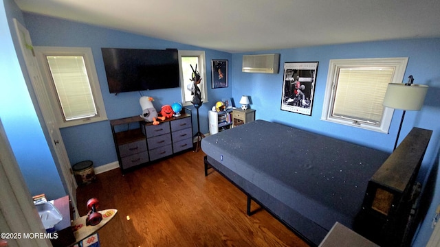 417 Carter Ave, Point Pleasant Beach, NJ 08742 - bedroom with wood finished floors, lofted ceiling, and an AC wall unit