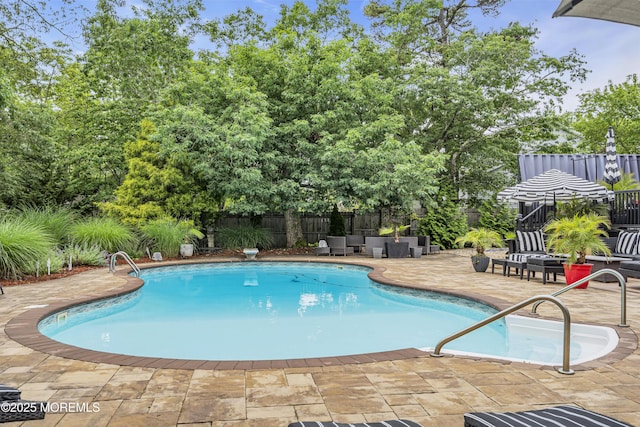 707 Cambridge Rd, Lanoka Harbor, NJ 08734 - view of swimming pool with a patio, a fenced backyard, view of scattered trees, and an outdoor living space