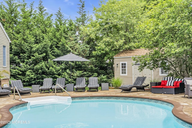 707 Cambridge Rd, Lanoka Harbor, NJ 08734 - outdoor pool with an outdoor structure, a patio, and an outdoor hangout area