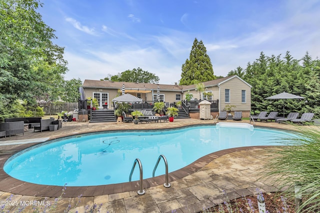 707 Cambridge Rd, Lanoka Harbor, NJ 08734 - swimming pool featuring an outdoor living space, a deck, and a patio area