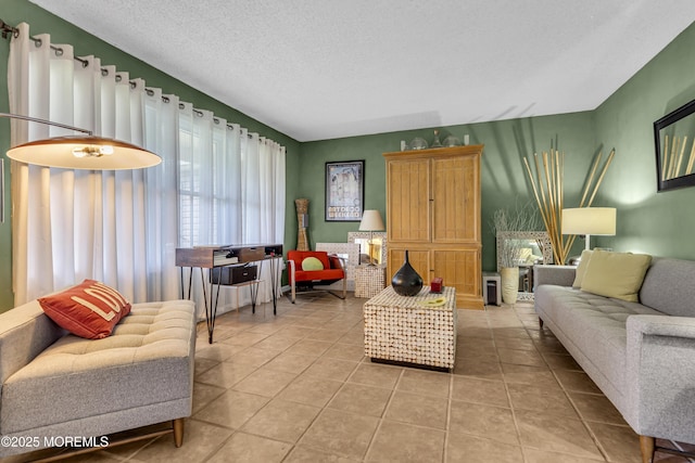 707 Cambridge Rd, Lanoka Harbor, NJ 08734 - living area with light tile patterned floors and a textured ceiling